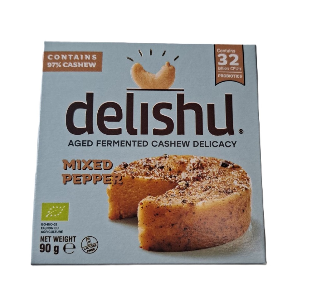 Delishu Fermentált, kesudió alapú érlelt sajt jellegű készítmény színes borssal