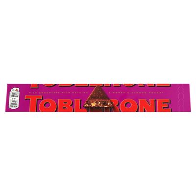 TOBLERONE svájci tejcsokoládé mazsolával, mézzel és mandulával 100 g